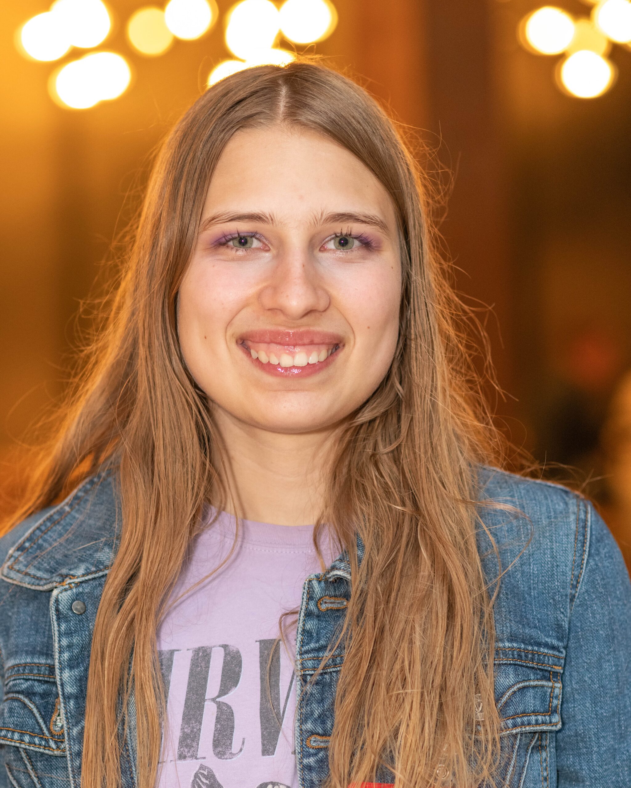 Mission Bit student attending Demo Day, where students present coding and computer science projects after completing their courses.